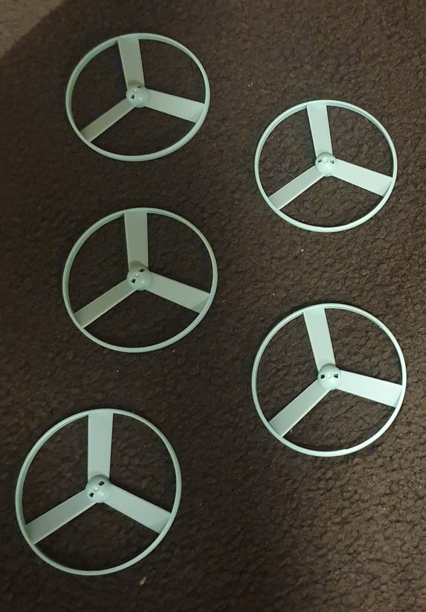 Set of 5 mint plastic wheels/rings